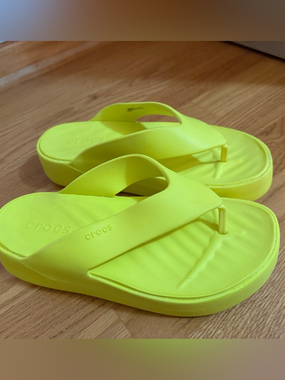 CROCS Women’s Platform wedge Flip Flop in Neon Yellow